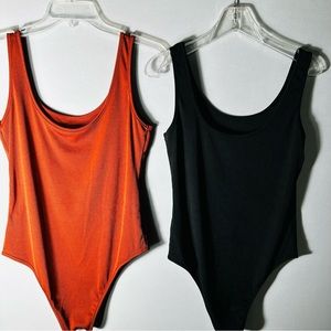 Pair of women’s one piece tank body suits - Size Large